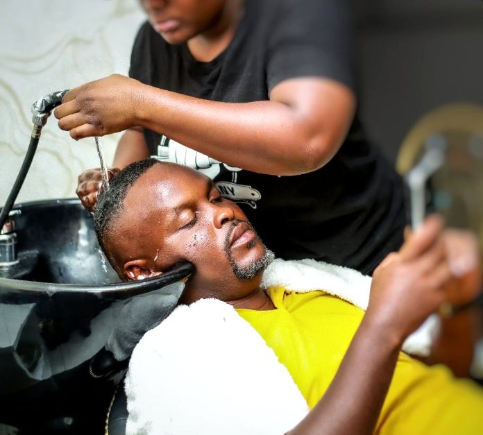 Men's grooming lounge at AIROS